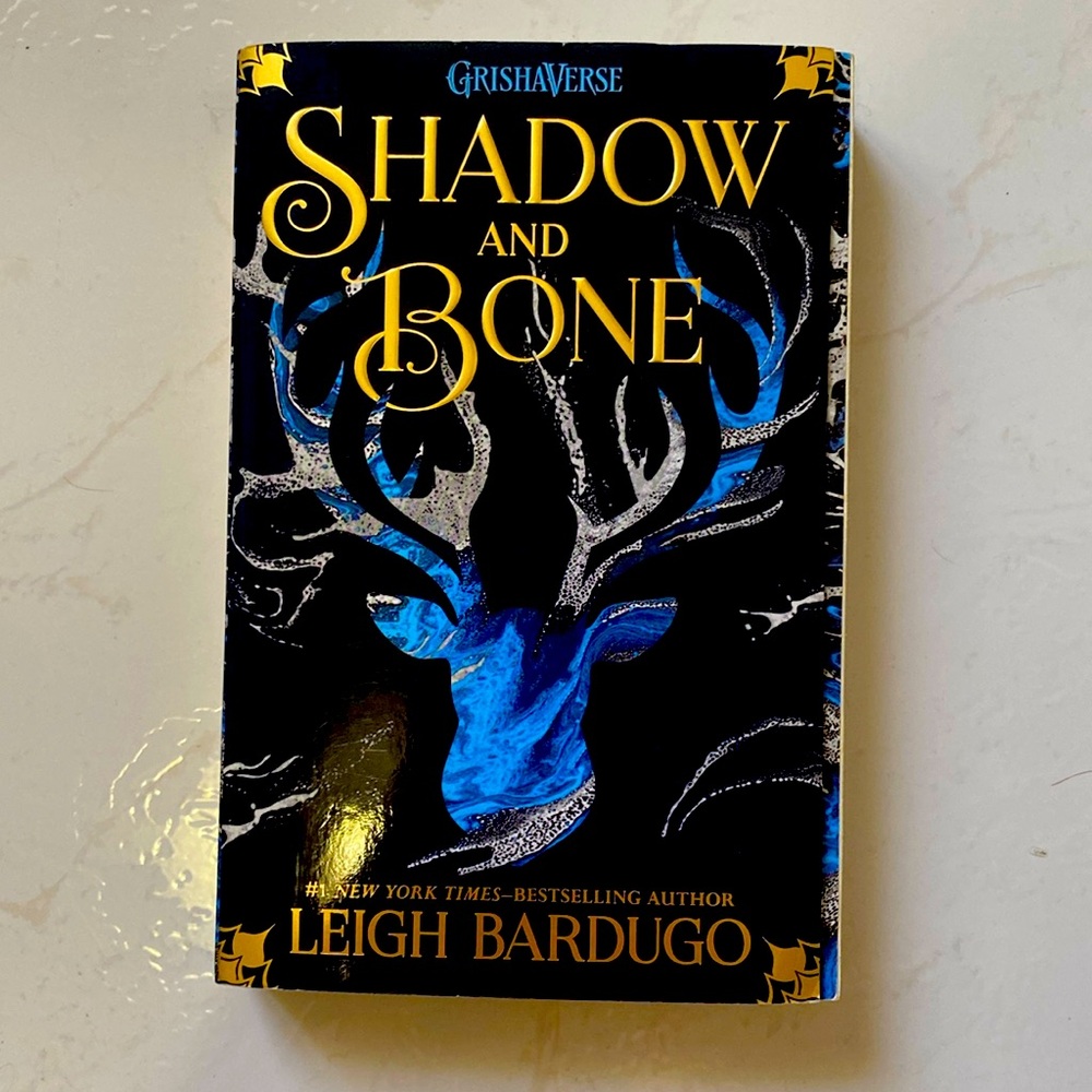 Autographed signed shadow and bone by Leigh bardugo